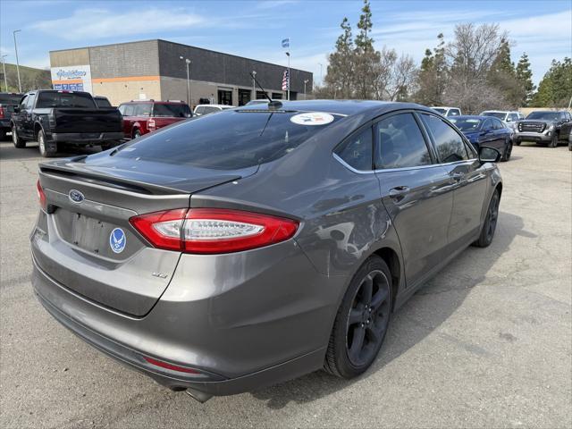 used 2014 Ford Fusion car, priced at $7,500