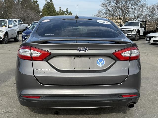 used 2014 Ford Fusion car, priced at $7,500