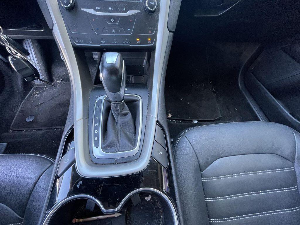 used 2015 Ford Fusion car, priced at $7,090