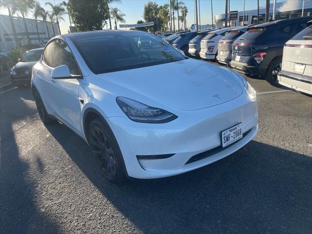 used 2023 Tesla Model Y car, priced at $33,899