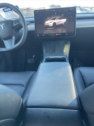 used 2023 Tesla Model Y car, priced at $33,899