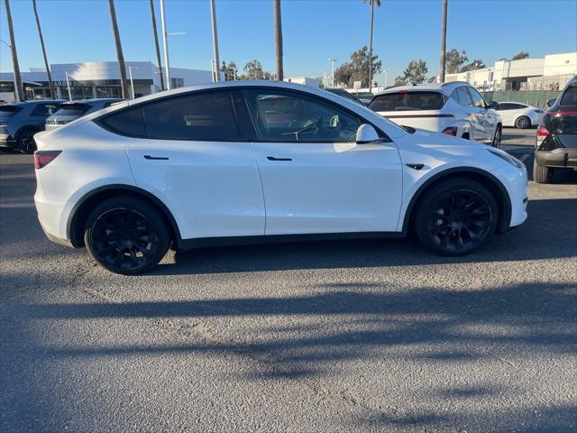 used 2023 Tesla Model Y car, priced at $33,899