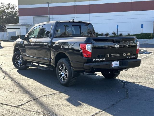 used 2022 Nissan Titan car, priced at $27,616