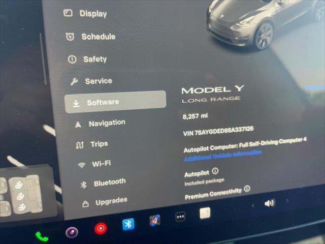 used 2025 Tesla Model Y car, priced at $39,606
