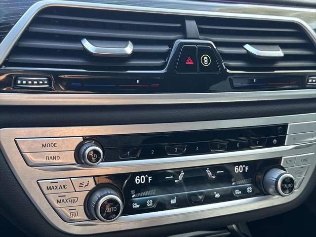 used 2022 BMW 750 car, priced at $49,933