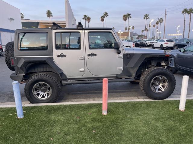 used 2015 Jeep Wrangler Unlimited car, priced at $15,831