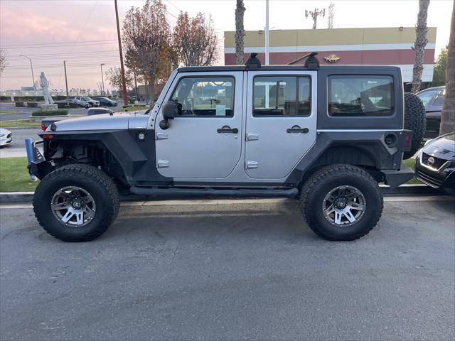 used 2015 Jeep Wrangler Unlimited car, priced at $15,831