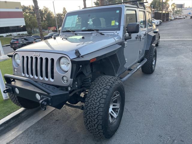 used 2015 Jeep Wrangler Unlimited car, priced at $15,831