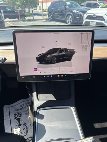 used 2023 Tesla Model 3 car, priced at $22,494