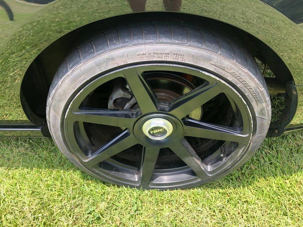 used 2014 Ford Mustang car, priced at $13,900