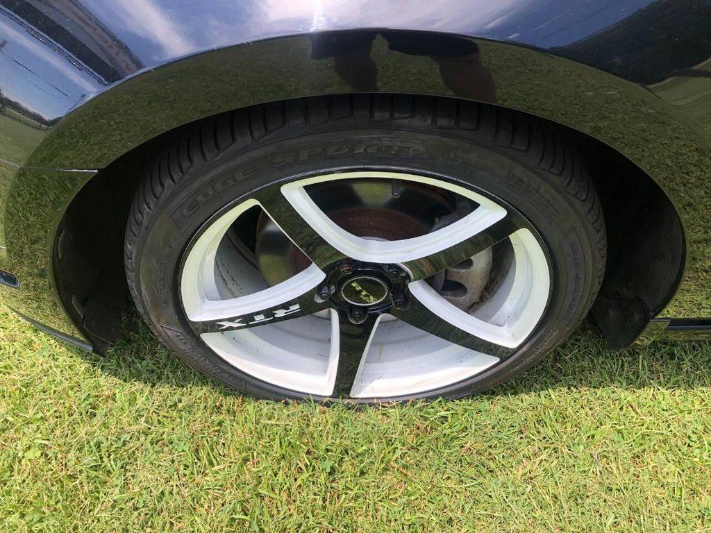 used 2014 Ford Mustang car, priced at $13,900