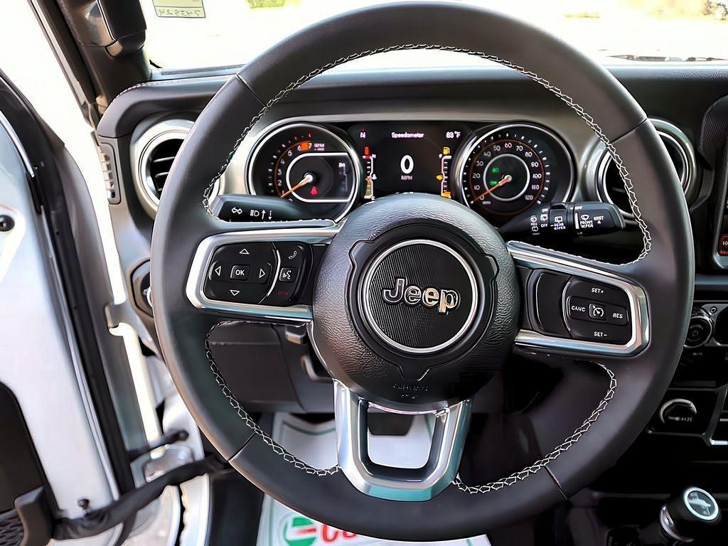used 2023 Jeep Wrangler car, priced at $33,547