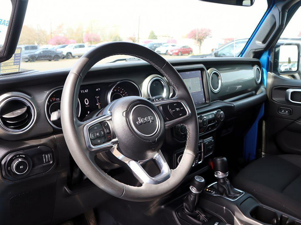used 2023 Jeep Wrangler car, priced at $32,699