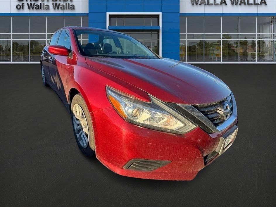 used 2016 Nissan Altima car, priced at $9,999