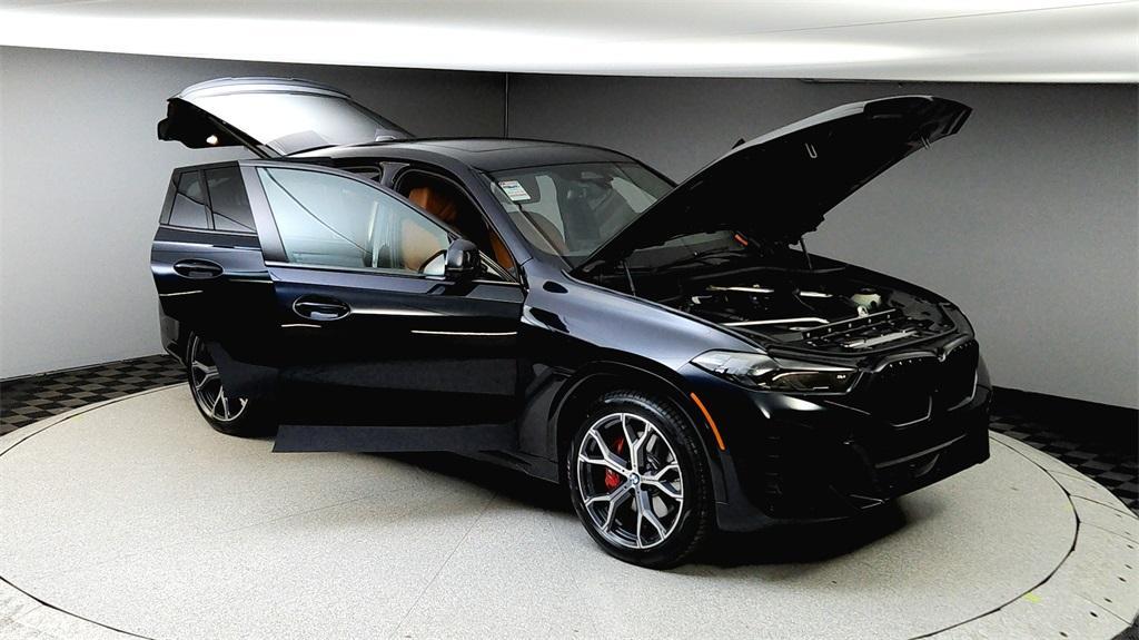 new 2025 BMW X6 car, priced at $87,875