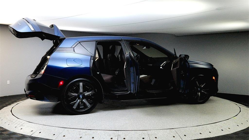 new 2025 BMW iX car, priced at $100,075