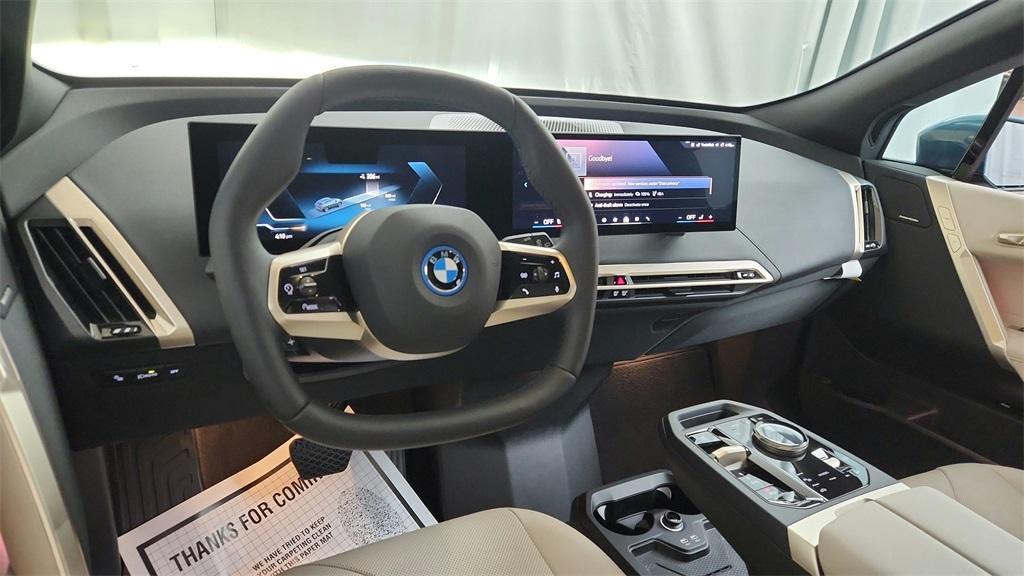 new 2025 BMW iX car, priced at $98,425