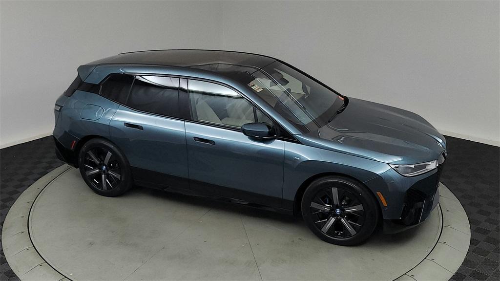 new 2025 BMW iX car, priced at $98,425