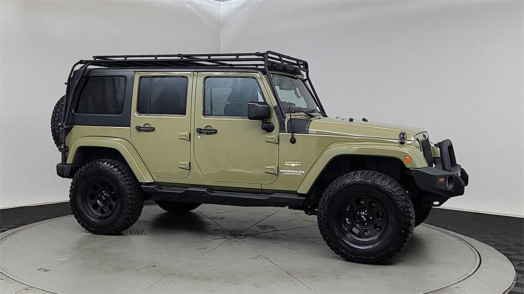 used 2013 Jeep Wrangler Unlimited car, priced at $14,770