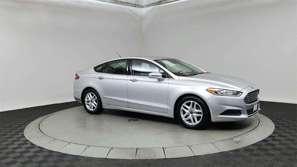 used 2015 Ford Fusion car, priced at $11,994