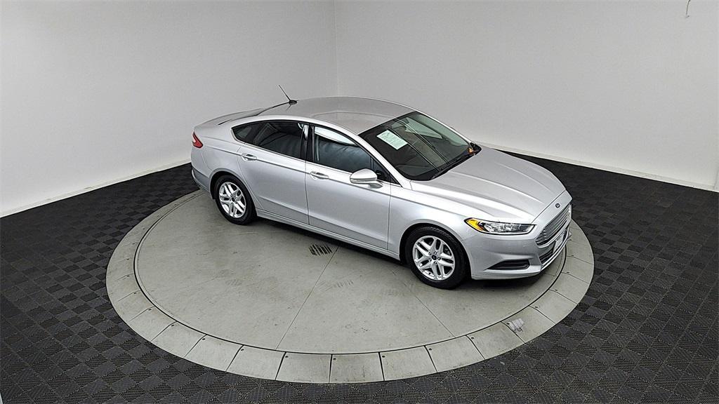 used 2015 Ford Fusion car, priced at $12,500