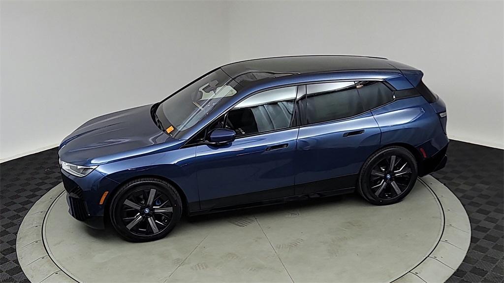 new 2024 BMW iX car, priced at $97,695