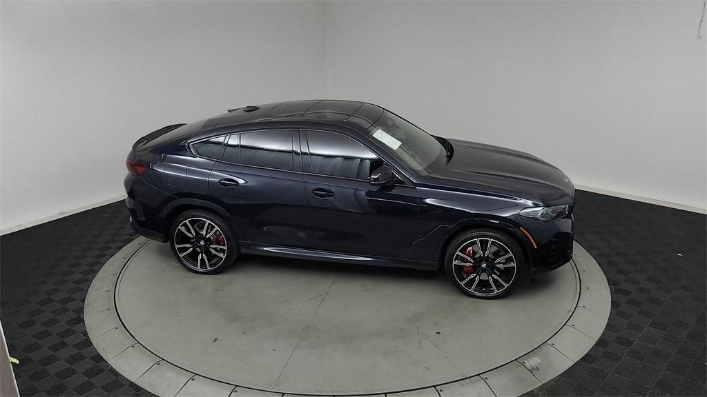 used 2024 BMW X6 car, priced at $87,440