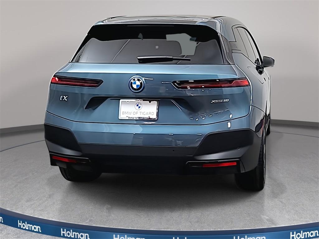 used 2025 BMW iX car, priced at $68,990
