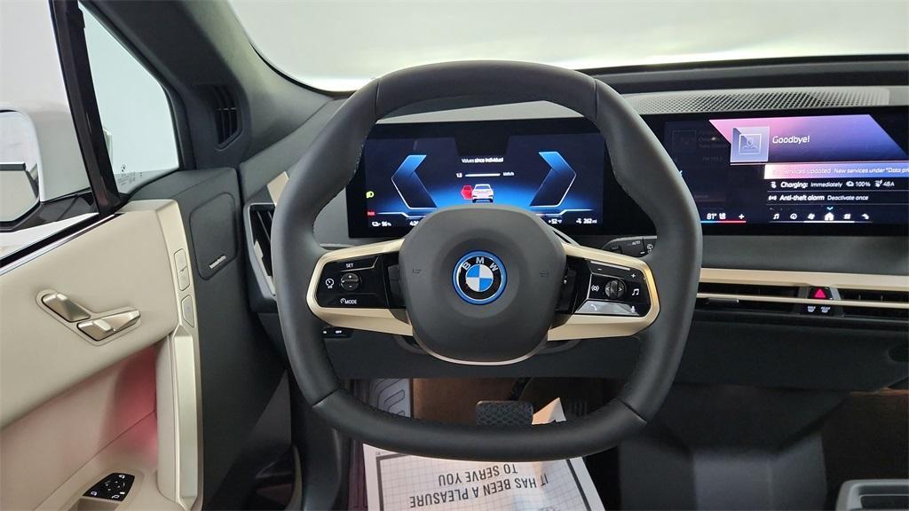 new 2025 BMW iX car, priced at $96,825