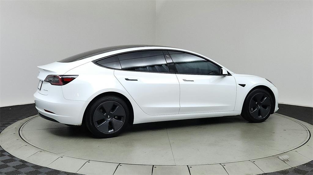 used 2023 Tesla Model 3 car, priced at $29,700