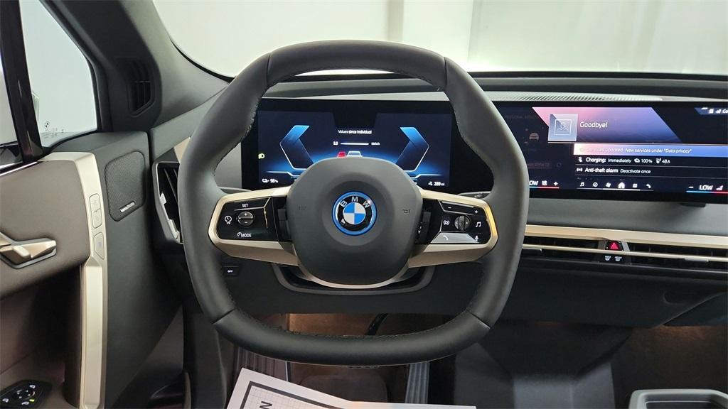 new 2025 BMW iX car, priced at $98,325