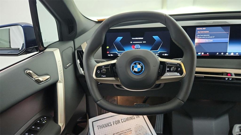 new 2025 BMW iX car, priced at $97,325