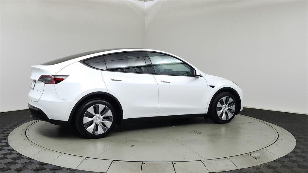used 2024 Tesla Model Y car, priced at $34,990