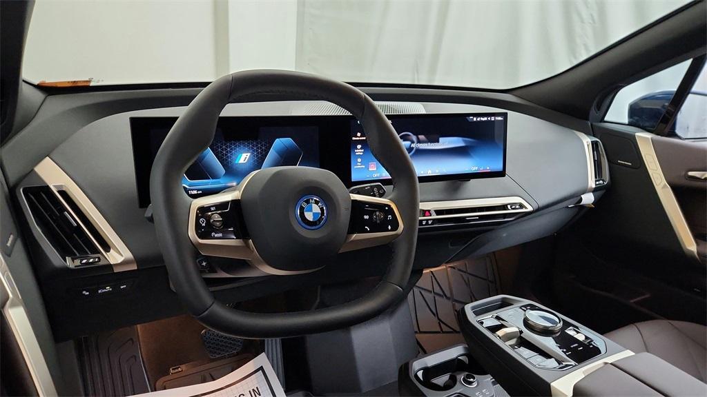 new 2025 BMW iX car, priced at $97,400