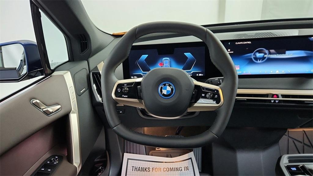 new 2025 BMW iX car, priced at $97,400