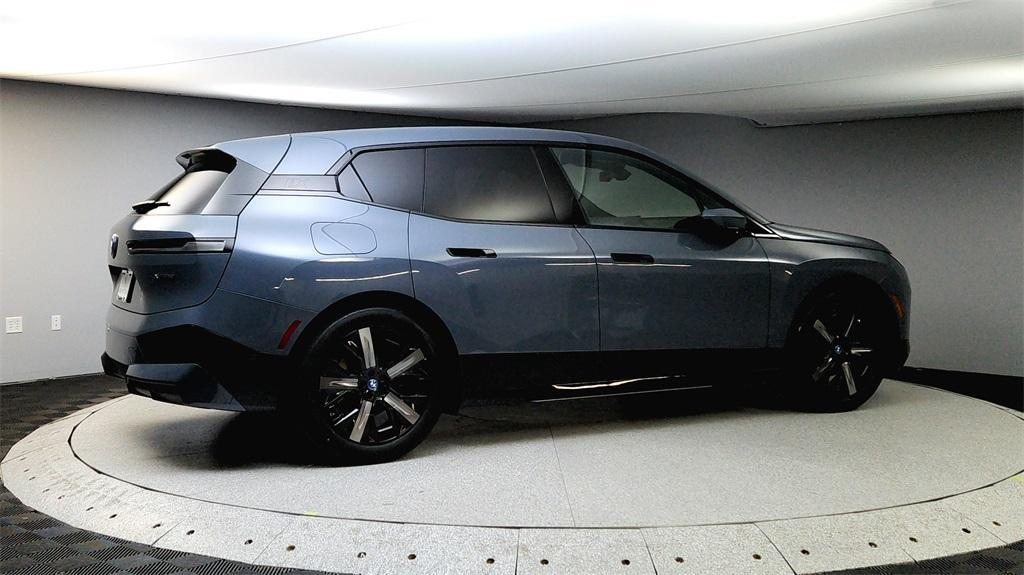 new 2025 BMW iX car, priced at $102,025