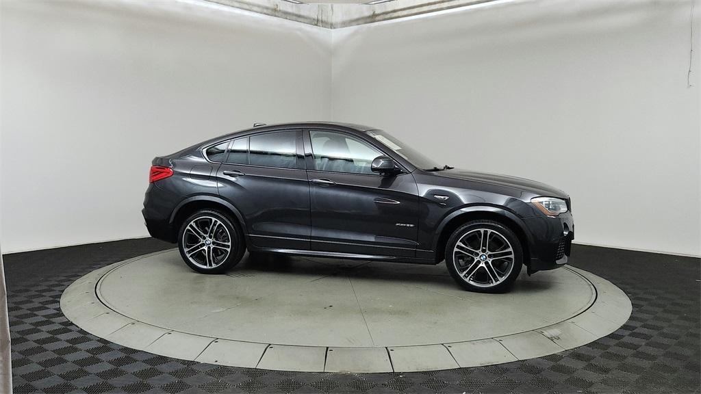 used 2015 BMW X4 car, priced at $12,499