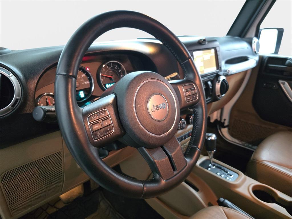 used 2015 Jeep Wrangler Unlimited car, priced at $18,770