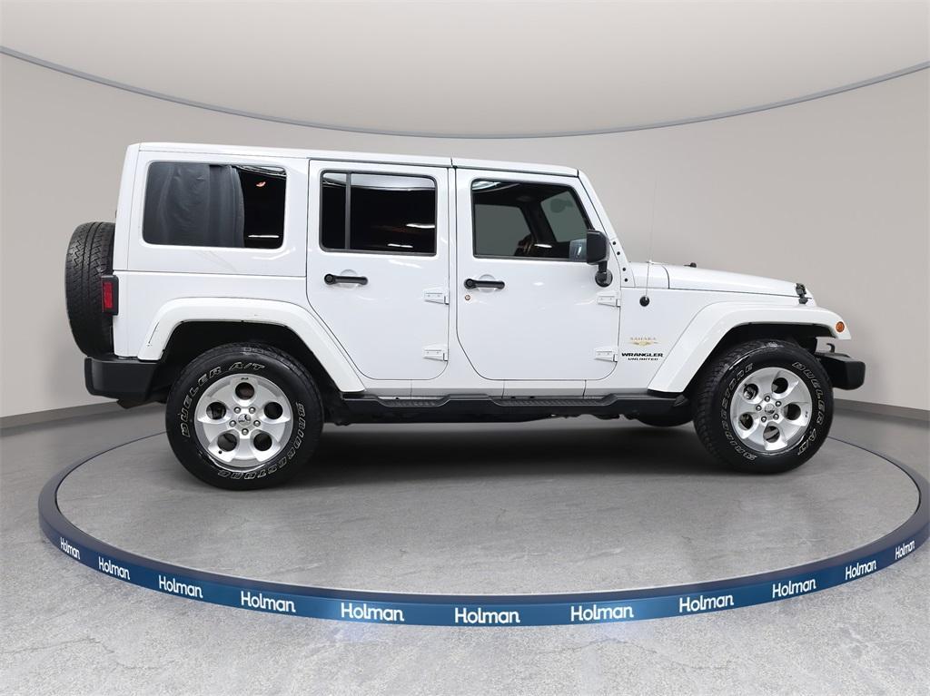 used 2015 Jeep Wrangler Unlimited car, priced at $18,770