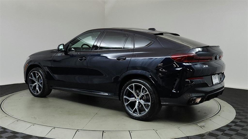 new 2025 BMW X6 car, priced at $85,685