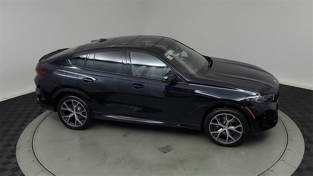 new 2025 BMW X6 car, priced at $85,685