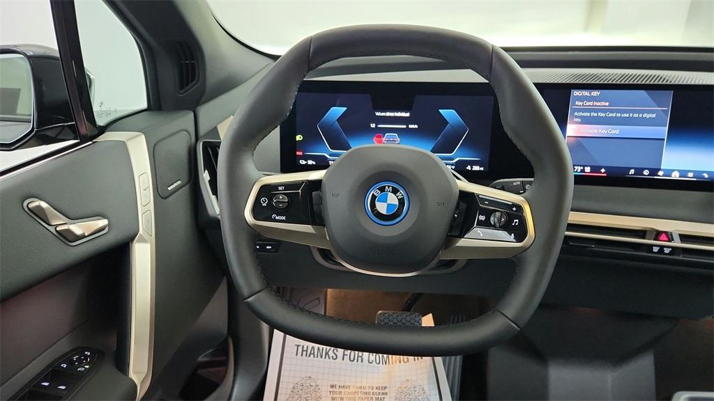 new 2025 BMW iX car, priced at $96,825