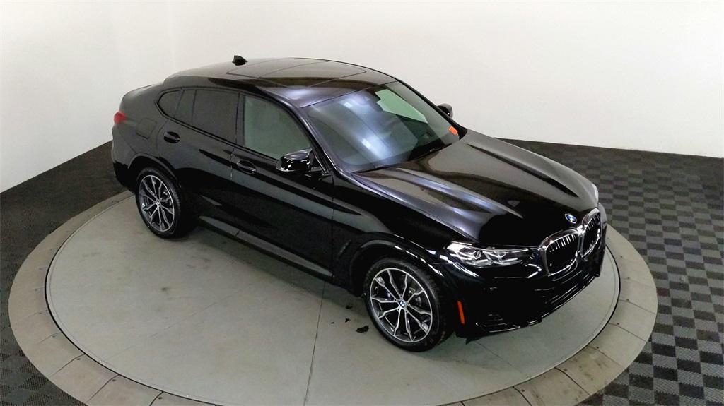 used 2022 BMW X4 car, priced at $50,990