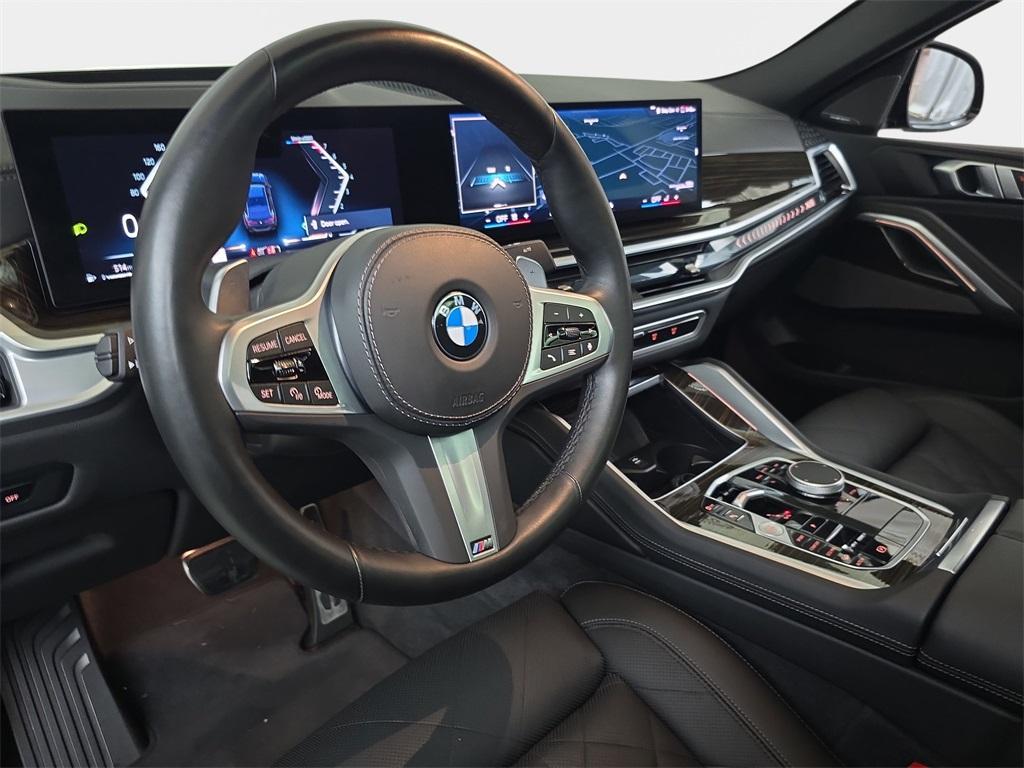 used 2025 BMW X6 car, priced at $68,980