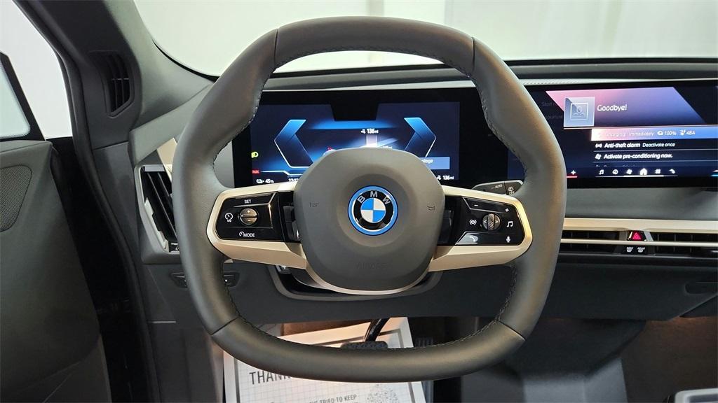 new 2025 BMW iX car, priced at $99,050