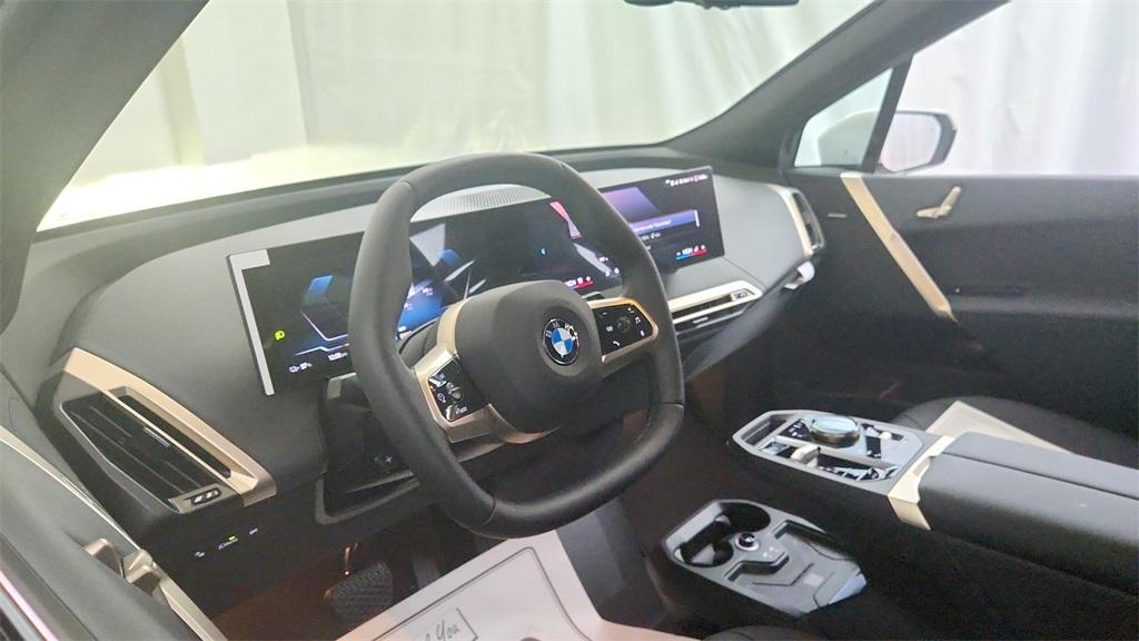 new 2026 BMW iX car, priced at $84,925
