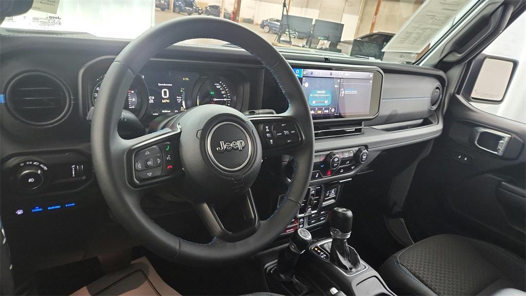 used 2024 Jeep Wrangler 4xe car, priced at $40,660