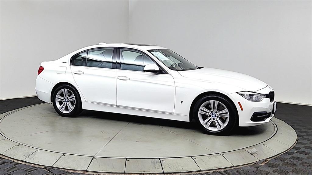 used 2018 BMW 330e car, priced at $16,711