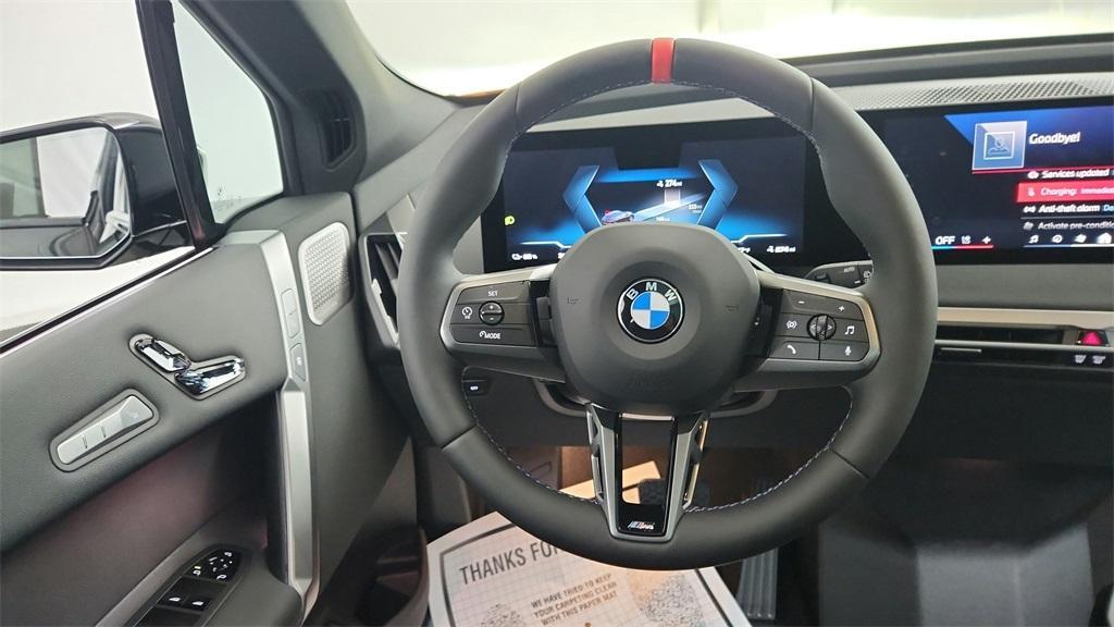 new 2025 BMW iX car, priced at $117,295