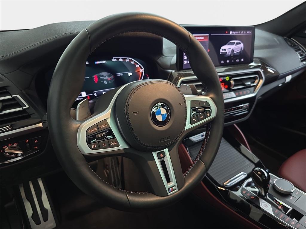 used 2025 BMW X4 car, priced at $63,990